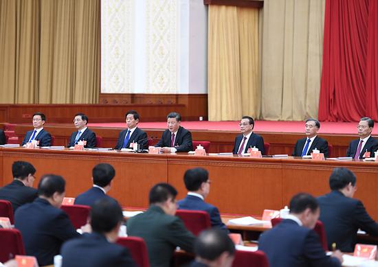 中国共产党第十九届中央委员会第四次全体会议，于2019年10月28日至31日在北京举行。这是习近平、李克强、栗战书、汪洋、王沪宁、赵乐际、韩正等在主席台上。新华社记者 张领 摄